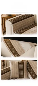 Detail of chenille sofa cover showing brown and beige checkerboard pattern and woven texture