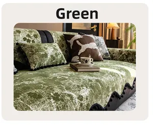 Detail of green chenille sofa cover featuring anti-scratch texture and black pom-pom fringe