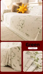 Detail of cartoon puppy sofa cover with fringes and soft beige knitted fabric texture