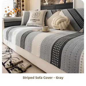 Detail of grey chenille sofa cover with striped weave texture and non-slip fabric surface