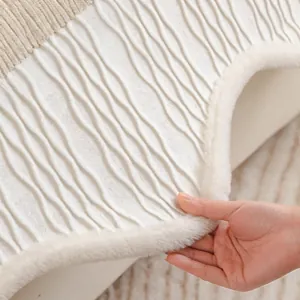 Irregular chenille sofa cover with wavy plush edges and soft textured fabric detail