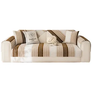 Chenille sofa cover set in beige and brown with striped patterns and floral pillows