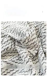 Macro detail of breathable chenille fabric with premium 3D geometric wave texture