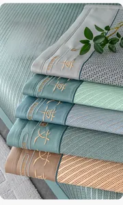Close-up of ice vine fabric textures with embroidery details and durable leather edges