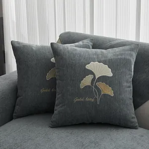 Dark gray Chenille sofa cushion with silver ginkgo leaf embroidery and Gold Leaf text