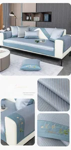 Detail of light blue ice silk sofa mat featuring elegant embroidery and floral patterns
