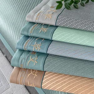 Summer wormwood cooling sofa mat with woven ice silk texture and embroidered edge