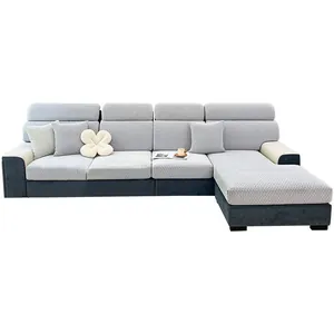 L-shaped chenille sofa cover in light gray herringbone pattern with decorative pillows