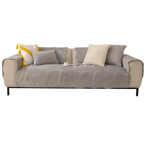 Grey leaf-patterned milk velvet sofa cushion cover set with matching pillows