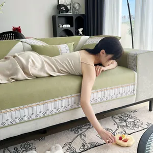 Green ice silk sofa mat set with geometric patterns for modern summer cooling decor