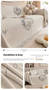 Détail de la housse de canapé en chenille grise à motif pissenlit avec franges douces