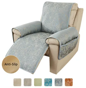 Detail of anti-slip backing on blue-grey fabric recliner cover with storage pockets