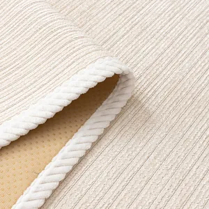 Beige chenille sofa cover with striped texture and non-slip backing for furniture protection
