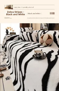 Close-up of zebra stripe plush sofa cover with soft black and white faux rabbit fur texture