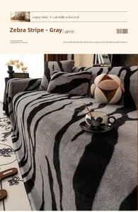 Detail of grey zebra stripe bubble rabbit plush sofa cover with soft textured fabric