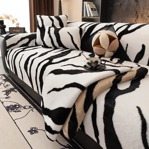 Plush zebra print faux rabbit fur sofa cover with matching decorative pillows