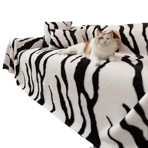 Faux rabbit fur zebra pattern sofa cover set with matching pillows and plush texture