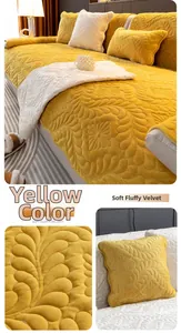 Detailed view of the yellow quilted velvet texture on a plush anti-slip sofa cushion cover