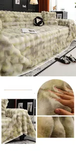 Close-up of soft tie-dye faux rabbit fur sofa cover in green with plush texture detail