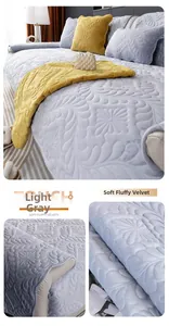 Detail of grey plush crystal velvet sofa cover with quilted floral pattern texture