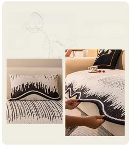 Detail of cream sofa cover with black irregular stripes and raised relief texture