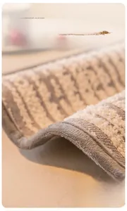 Macro shot of thick plush grey striped sofa cover with reinforced stitched edges