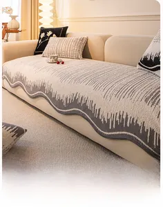 Detailed close-up of chenille sofa cushion with grey glacier wave pattern and wavy edges