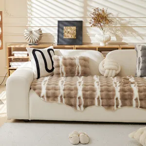 Plush faux rabbit fur sofa cover with vertical gradient patterns and matching pillows