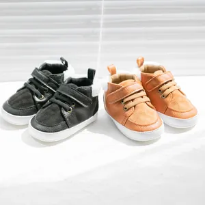 Detail view of warm infant shoes with cozy faux fur lining and dual velcro straps
