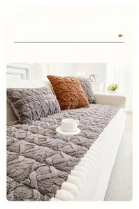 Detailed view of thick velvet sofa cushion with diamond patterns and plush white piping