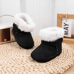 Bottes d'hiver pour bébé en daim noir avec col en fausse fourrure blanche et semelle souple