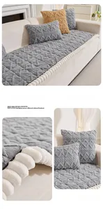 Close-up of light grey Taffeta Velvet sofa cover with plush pom-pom edges and 3D texture