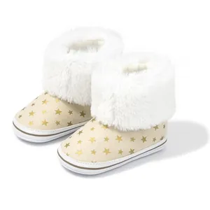 Baby winter snow boots with gold star prints and thick faux fur lining for toddlers
