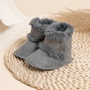 Bottines d'hiver grises pour bébé avec bordure en fourrure et semelle souple antidérapante