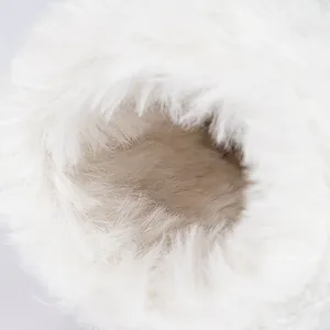 Close-up of soft white faux fur lining and plush texture for warm baby boots