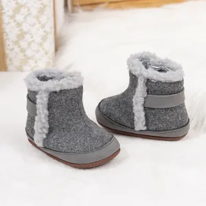 Botas de nieve para bebé en fieltro gris oscuro con forro de pelo y suela antideslizante