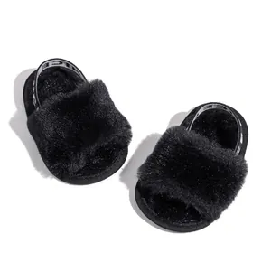 Detail of plush baby slides with sparkly faux fur and elastic NICE back strap
