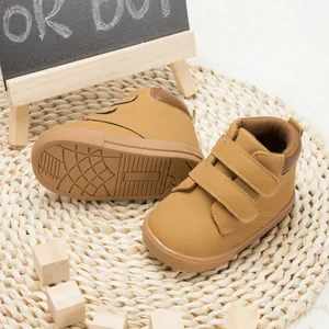 Classic tan PU leather toddler sneakers with dual hook-and-loop straps and non-slip sole