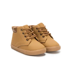 Detailed side view of toddler camel lace-up boots with high-top collar and rubber sole