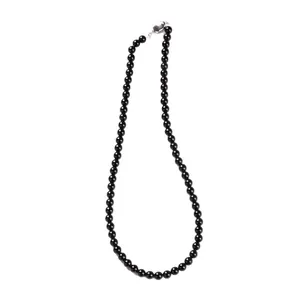 Minimalist natural black agate beaded necklace with a silver metal clasp on white background