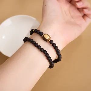 Bracciale a doppio giro in legno naturale 6mm con argento S925 e ciondolo inciso