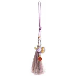Pendentif traditionnel à pompon violet avec calebasse en laque et ornement éléphant