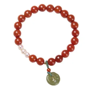 Chinese style red agate bracelet with freshwater pearls and green jade safety buckle charm