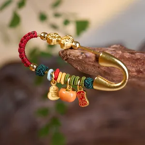 Chinese New Year lucky horse brooch with golden gourd and persimmon charms for good fortune