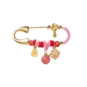 Traditional Chinese Year of the Horse gold brooch with lucky peach and gourd charms