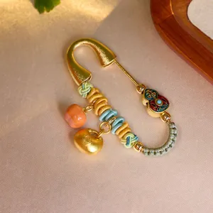 Golden zodiac horse brooch with colorful cord, peach, apple and enamel gourd pendants