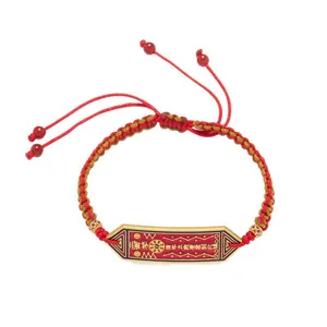 Bracelet tressé porte-bonheur en agate rouge avec breloque dorée et symboles chinois