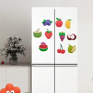 Set d'aimants de réfrigérateur 3D aux fruits créatifs sur un réfrigérateur blanc moderne