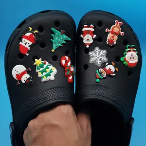 Christmas themed PVC shoe charms set featuring Santa and Reindeer for clogs