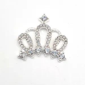 Detail of silver crown shoe charm with white crystal rhinestones for clogs and sandals